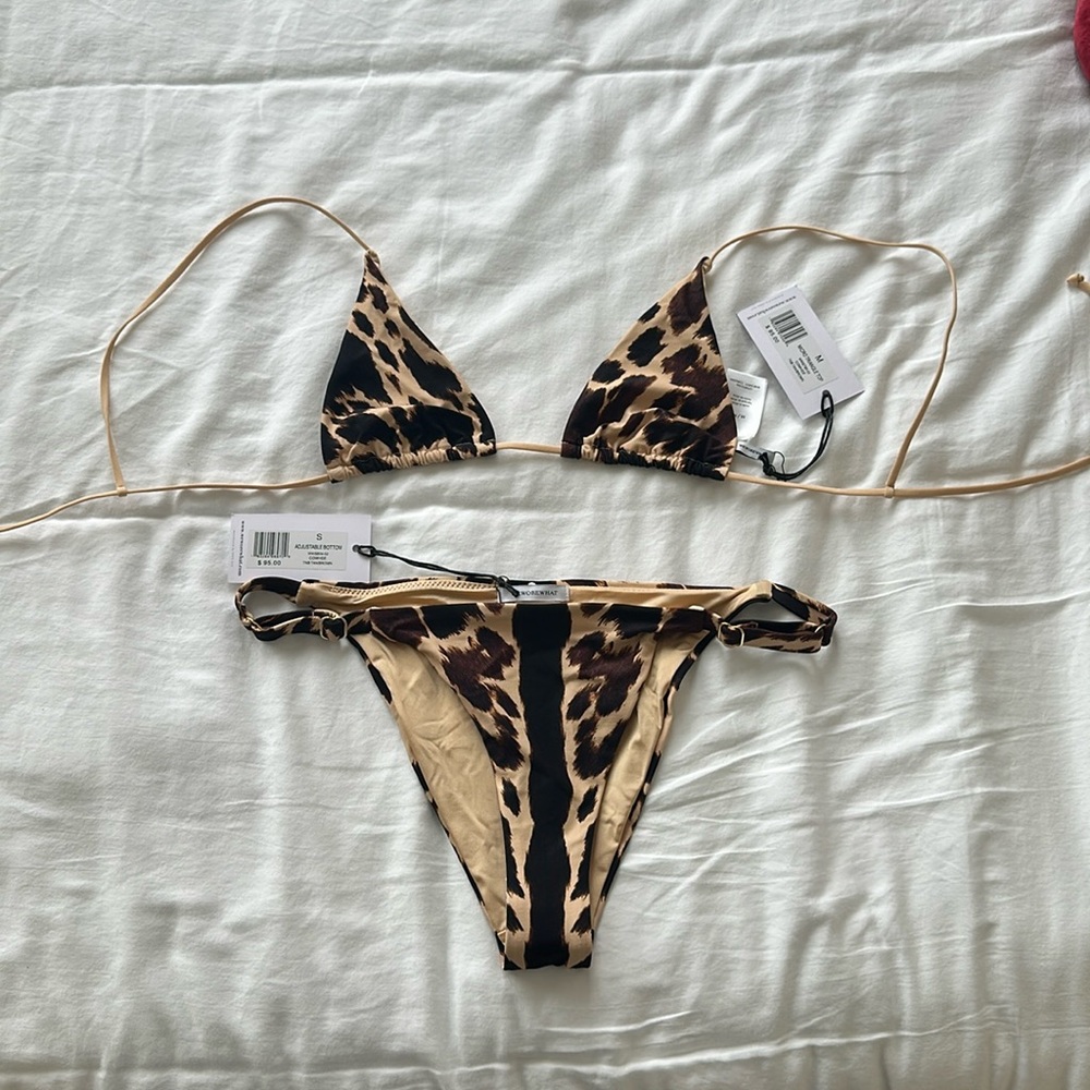 We Wore What Small adjustable bottom and medium micro triangle top. Never worn